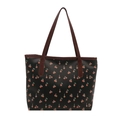 Chic black tote bag featuring red cherry prints with contrast brown leather handles - Black