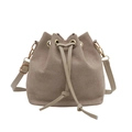 Minimalist beige drawstring bucket bag with gold hardware and matte suede texture - Khaki