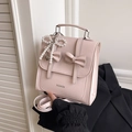 Sac à main rose style collège grande capacité avec nœuds et pendentif en perles - Rose