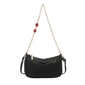 Black lychee texture underarm bag with gold chain and red strawberry charms - Black