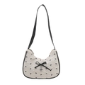 Chic white crescent shoulder bag with black bow print and silver heart pendant - White