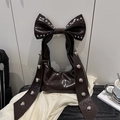Chic coffee brown bow handbag with silver rivets and cloud pleats on white silk - Brown