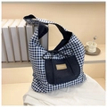 Detail of blue vichy plaid tote bag featuring denim pocket and bow knot decoration - Blue Checkered Side A
