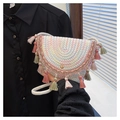 Bohemian woven saddle bag featuring multi-color fringe and cotton rope shoulder strap - Pink