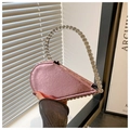 Dettaglio borsa a cuore rosa metallizzato con manico circolare decorato con strass - Rosa
