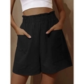 Detail of high waisted black cotton linen shorts with elastic paperbag waist and large pockets - S / Black
