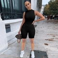 Slim fit sleeveless black knit romper for women with a round neck and waist shaping design - XS / Black Short