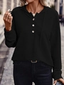 Close-up of black hooded jacket featuring textured crinkle fabric and buttoned henley neck - S / Black