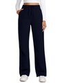 Detail view of navy blue wide-leg sweatpants featuring adjustable drawstring elastic waist - Navy Blue