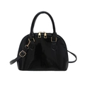 Glossy black shell-shaped handbag with golden hardware and double handles in a mirror finish - Black