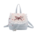 Light blue lace-trimmed backpack featuring a large red satin bow and heart charm - Blue