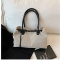 Chic two-tone canvas tote bag with black leather handles and golden buckle detail - Black
