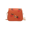Mini orange crossbody bag with strawberry print and gold chain strap on white background - Orange