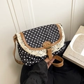 Borsa a tracolla vintage a pois neri con bordo in pizzo beige e cinturini in pelle - Nero
