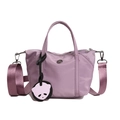 Purple nylon dumpling cross-body bag with adjustable strap and panda charm - Purple