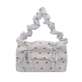 Light blue ruched handbag with red bow print and drawstring ruffles in a floral style - Blue