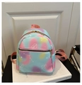 Close-up of heart embroidery on gradient nylon backpack with gold zipper detail - Green