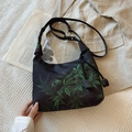 Black crescent bag with green leaf pattern and adjustable nylon shoulder strap - Green Bamboo