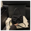 Elegante borsa nera con paillettes e grande fiocco, dotata di manico e tracolla rimovibile - Nero