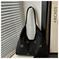 Large black faux suede tote bag featuring delicate laser-cut floral hollow patterns - Black