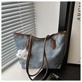 Blue denim texture tote bag with brown leather handles and a white cloud plush charm - Blue (With Charm)