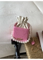 Detail of pink snake-pattern leather bag with large pearl handle and drawstring pouch - Pink