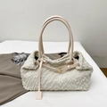 Chic ivory faux fur tote bag with smooth leather handles and gold buckle detail - White Bouclé