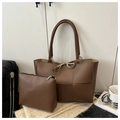 Dark brown woven leather tote bag set with matching interior pouch on knitted surface - Coffee