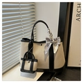Beige canvas tote bag with black leather trim, mini charm, and heart print silk scarf - Black