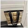 Medium quilted gold tote bag with black nylon shoulder straps and square stitching - Gold
