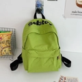 Zaino verde neon capiente con stampa Subtex ed etichetta fashion arancione laterale - Verde