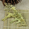 Three golden reindeer Christmas ornaments with textured finish on a bamboo background - 13cm Gold