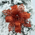 Glittering bronze artificial Christmas flower with hollow petals on snowy pine branches - Red