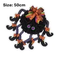 Dettaglio di ghirlanda a ragno di Halloween da 50cm con zampe a strisce viola e fiocchi arancioni - 53x4x53cm / Ghirlanda di Ragno di Halloween a Otto Zampe