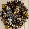 Halloween skull wreath with black and gold ribbons and Enter If You Dare wooden sign - Black Gold Style