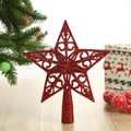 Dettaglio della punta dell'albero di Natale a stella rossa glitterata e cava - Rosso