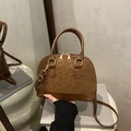 Bruine vintage shell bag van luipaard suède en glad leer met handvatten aan de bovenkant - Bruin