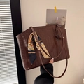 Deep brown crocodile texture tote bag with a patterned silk scarf on the handle - Brown