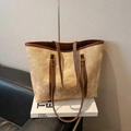 Vintage canvas shopper met bruine leren handvatten en gouden metalen details - Khaki