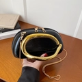 Chic black glossy half-moon chain bag with oversized oval gold metal handle - Black