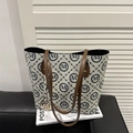 Chic cream tote bag with blue M-pattern print and brown leather handles - Gray