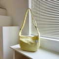 Light yellow canvas crescent shoulder bag with cute white puppy pendant and strap - Yellow