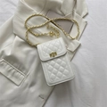 White quilted crossbody phone bag with gold chain strap and metal buckle closure - White