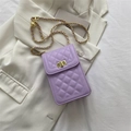 Quilted lavender lavender crossbody bag with gold chain strap and metal lock closure - Purple