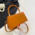 Chic orange leather crossbody square bag with top handle and gold hardware detail - Yellow Brown