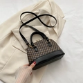 Vintage-Schultertasche mit braunem Muster, schwarzem Ledergriff und Umhängeriemen - Schwarz
