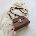Minimalist dark brown trapeze handbag with gold T-lock and adjustable shoulder strap - Brown