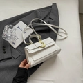 White faux-crocodile crossbody bag with ornate gold buckle and detachable shoulder strap - Off-white