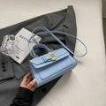 Light blue faux crocodile textured square handbag with golden baroque buckle detail - Blue