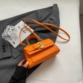 Chic orange faux crocodile leather handbag with golden buckle and crossbody strap - Orange